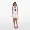 White Peplum Pointelle Knit Mini Dress White Peplum Pointelle Knit Mini Dress